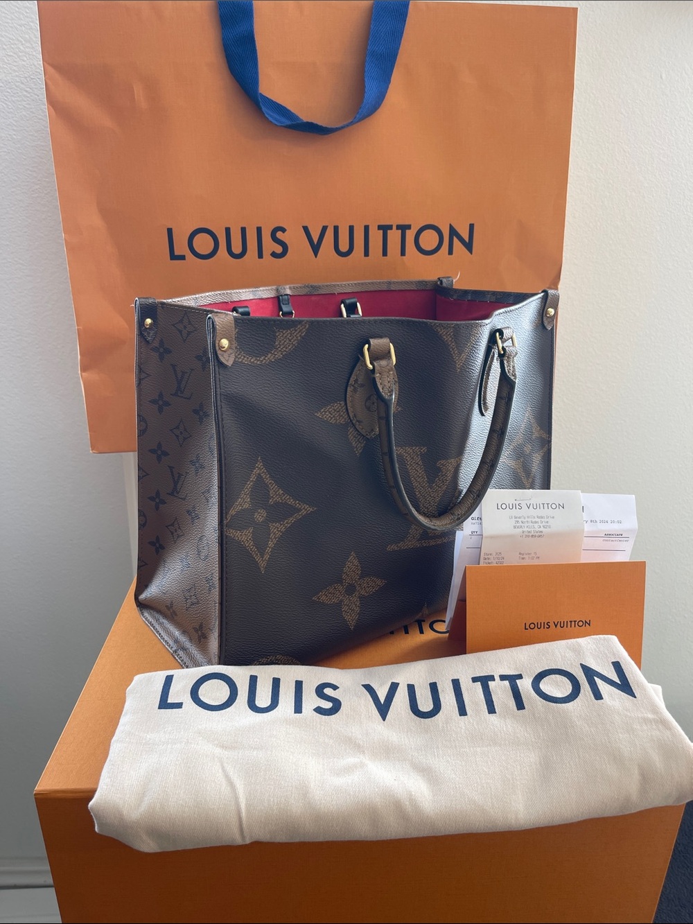 Louis Vuitton OTG “On The Go”Brown Monogram Reverse Tote with Red Interior